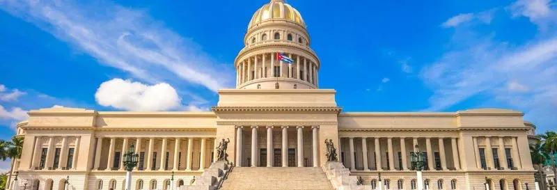 Hiking in the Sierra del Infierno at Sunrise. Go hiking in the Sierra del Infierno to admire one of the most beautiful sunrises in Cuba while discovering the traditions of the local community. Itinerary: At the agreed time, meet at the baseball stadium, located on Adela Azcuy Norte Street. After a short 15-minute car ride, you will arrive at the foot of the Sierra del Infierno, the starting point of the hike. You will begin the ascent of the mountain, discovering the particularities of the terrain as well as the fauna and flora of this Cuban region. Several breaks will be planned to contemplate the beauty of the sun rising over the typical mounds of Viñales. One of the stops will be the Los Acuáticos region, where several families reside who cherish water and attribute healing power to it. You will explore the customs and habits of this community. You will continue the hike until you reach the summit of the sierra. At the top, a breathtaking panoramic view of the valley awaits you. Get ready to have your breath taken away! At the end of this three-hour activity, you will descend back to the bus to return to the meeting point in Viñales. How does it work? You will have the opportunity to go on a hike, guided by experts, who will explain the wonders of the Sierra del Infierno. This experience includes: Round-trip transport from the meeting point, Specialized guide during the whole hike, Assistance for the discovery of local traditions, Breaks to admire the landscapes. Not included: Meals and drinks, Personal insurance. The meeting place is located at the baseball stadium on Adela Azcuy Norte Street. Please ensure you arrive at the agreed time so as not to miss the start of the activity.