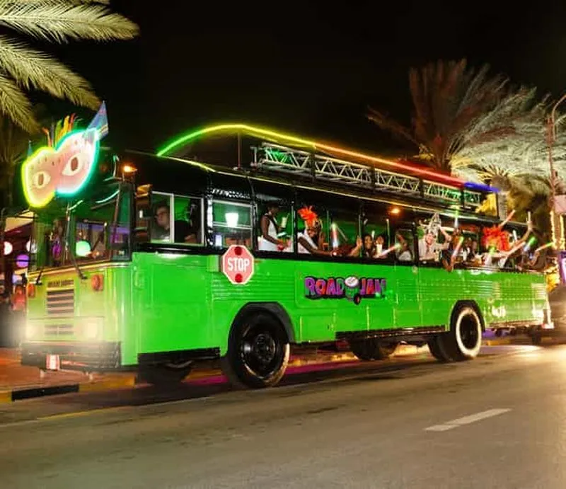 Aruba Nightlife Bus Tour with Unlimited Drinks and DJ - experience in Aruba